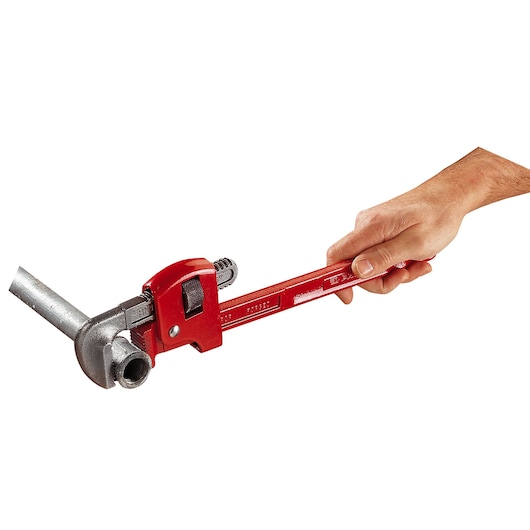 Photo of Facom 134A_14 red pipe wrench in use, gripping a metal pipe, white background, side angle.