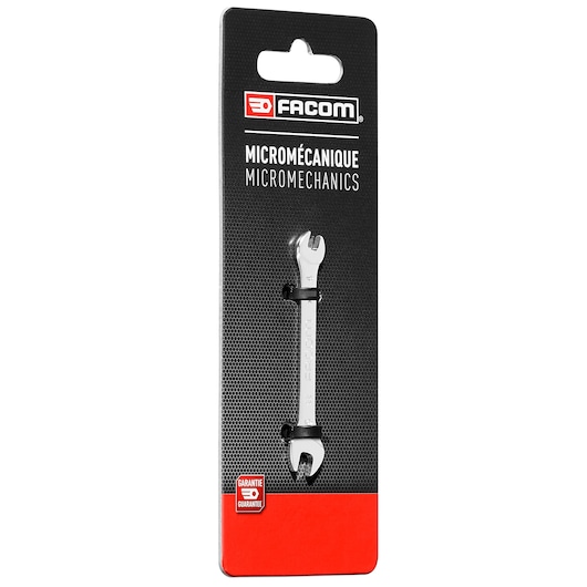 Photo of Facom 22_3_2X5_5 micromechanics open-end wrench on retail packaging, angled view, black and red card.