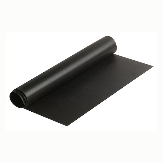 Facom 2600A2 black rubber mat unrolled on white background, workshop accessory photographed at an angle.