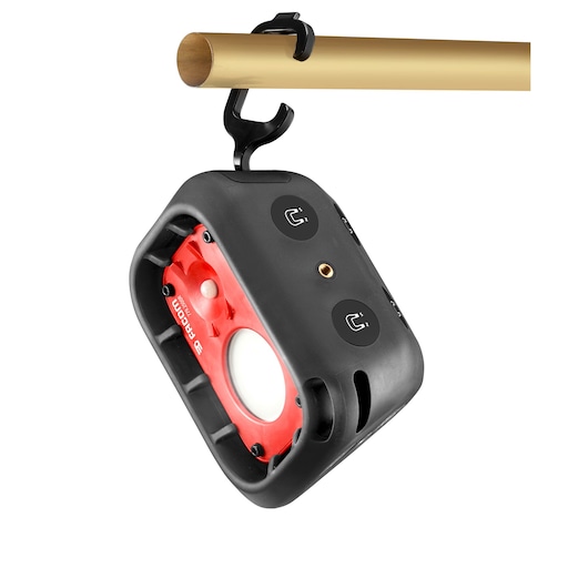 Facom 779.2500RPB portable work light with red and black casing, magnetic mount, hook hanging on metal pipe, front angle.
