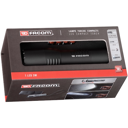 Photo of Facom 779.CBTPB LED compact torch in black cardboard packaging, shown at an angled view.