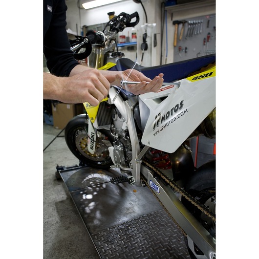 Facom 98B_14 T-handle hex key used on motorcycle in workshop, photo showing close-up in action.