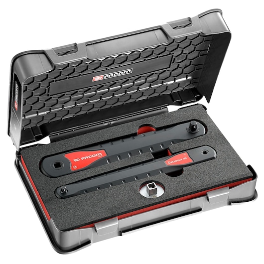 Facom AXS_J2 ratchet wrench set in black hard case with foam insert, angled view.