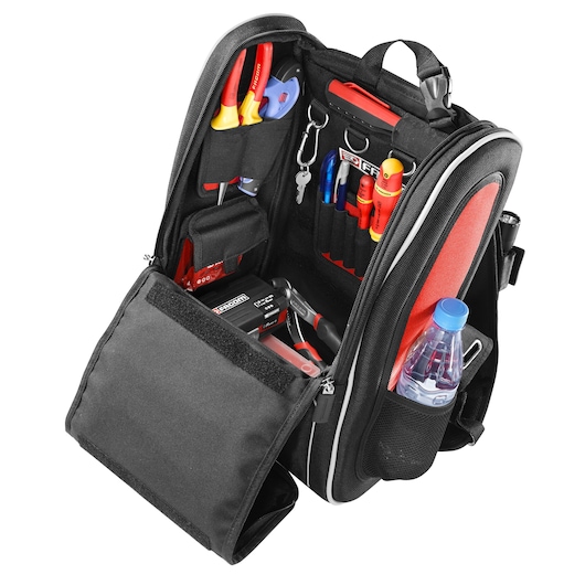 Facom BS.MCBPB tool backpack with open compartments, visible hand tools, front pocket, and side water bottle.