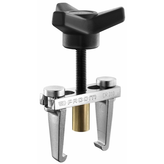 Facom CR_D10 bearing puller, silver metal with black handle and brass center, studio angle.