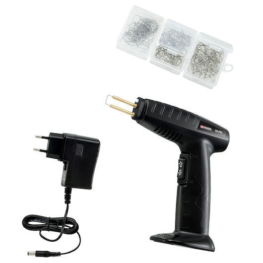 Facom CRPSC plastic welding kit with black welding tool, charger, and three boxes of metal staples, side view.