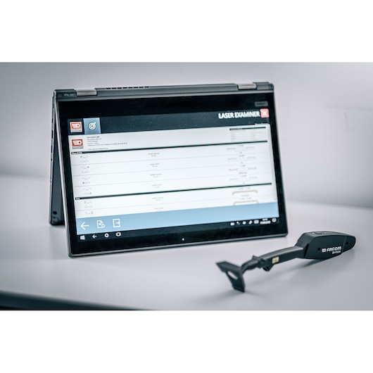 Facom DX_TSCANPB diagnostic scan tool with digital display screen and handheld scanner on table, front angle.