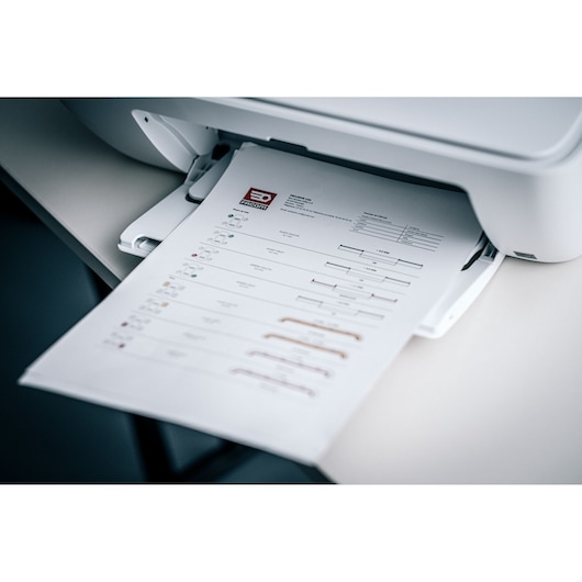 Facom DX_TSCANPB photography of printed product sheet with Facom logo exiting printer.