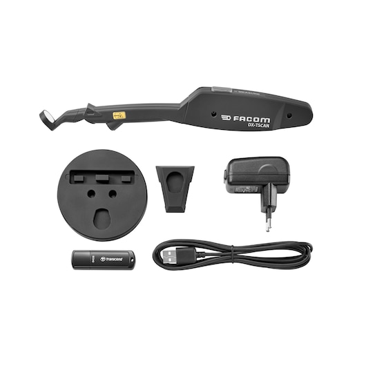 Facom DX_TSCANPB photography tool kit including a handheld scanning device, a round base, a small mounting bracket, a wall charger, a USB cable, and a USB flash drive, all displayed on a white background.
