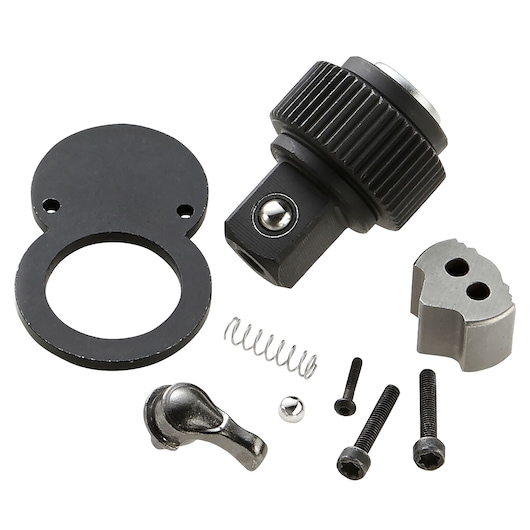 Facom E100501 ratchet repair kit with metal parts and screws, top view, white background.