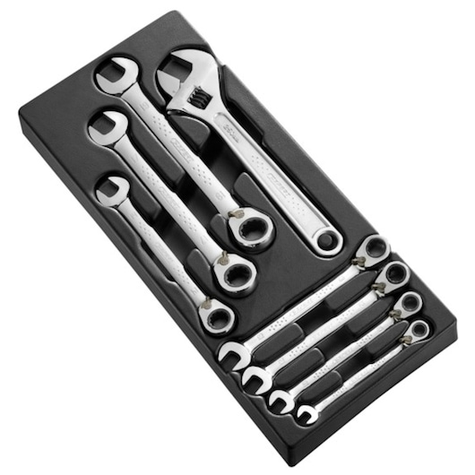 Facom E111100 hand tool set with wrenches and adjustable spanner in black tray, top view.