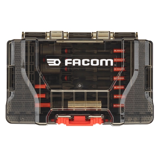 Facom branded transparent hard plastic case containing multiple screwdriver bits and accessories. The case has a visible logo and a red latch.