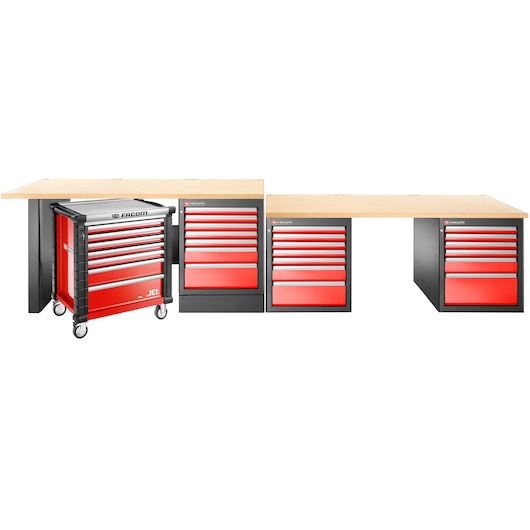 A Facom workbench setup with three wood-top work surfaces and multiple red and black tool storage cabinets, including a mobile tool chest on wheels.