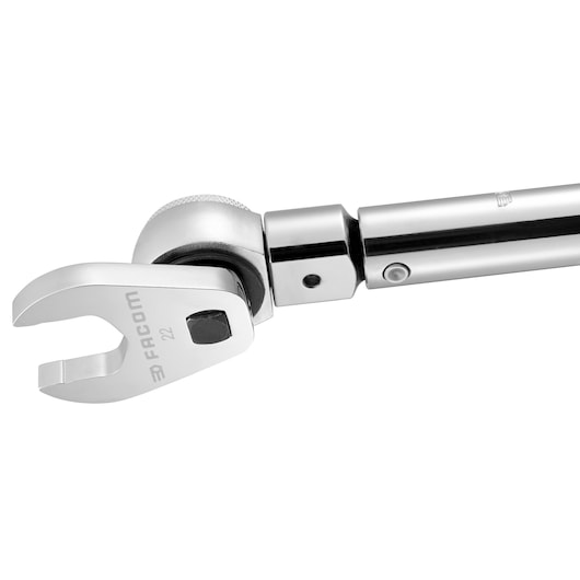 Facom J_10CF chrome open-end wrench head on extension bar, close-up angle, white background.