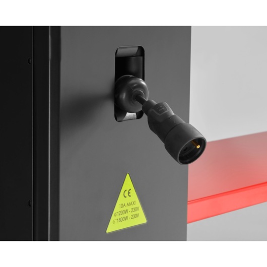Facom JLS3-PSHPOWER power outlet socket close-up on black equipment panel with yellow warning label, photography side view.