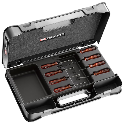 Facom MODARCJ8L pick and hook set with eight tools in brown handles, arranged in a black hard case, top view.