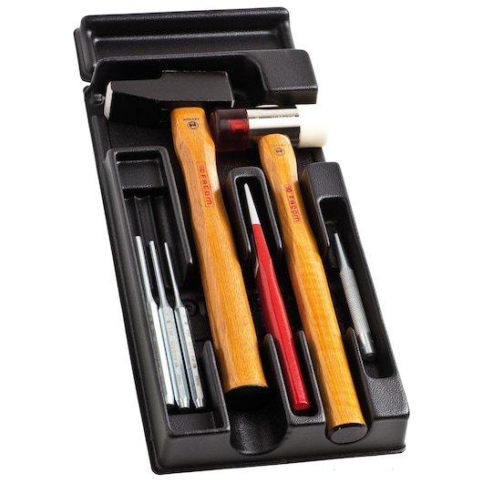 Facom MODMI1 hammer and punch set with wooden handles and metal tools in a black tray, top view.