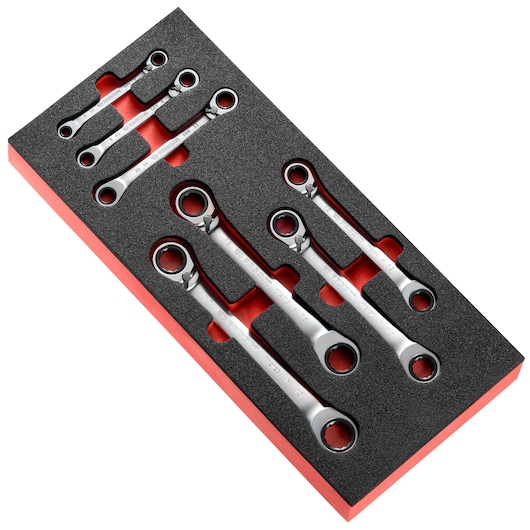 Facom MODM_65J7 ratcheting wrench set in foam tray, photography, top angle, six silver tools visible.