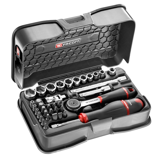 Facom R_161-6P6 ratchet and socket set with bits and screwdrivers in black plastic case, top view.