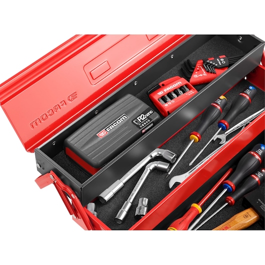 Facom R2NANOPB tool set with assorted screwdrivers, hex keys, sockets, and wrenches in a red metal toolbox, top view.