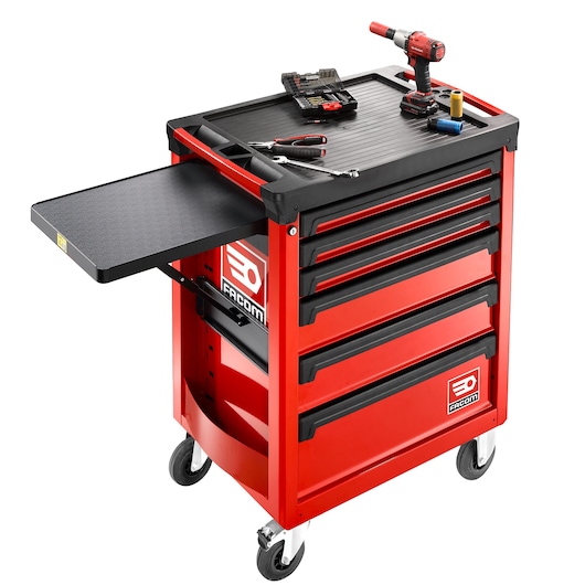 Facom ROLL.6M3A red tool trolley with drawers, pull-out tray, and assorted tools, front angle.