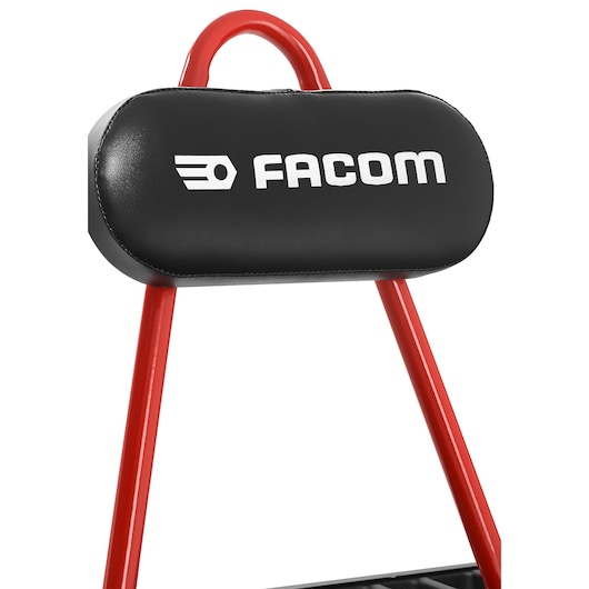 Facom TCS-P1 padded black headrest with logo on red metal frame, front angle, photography