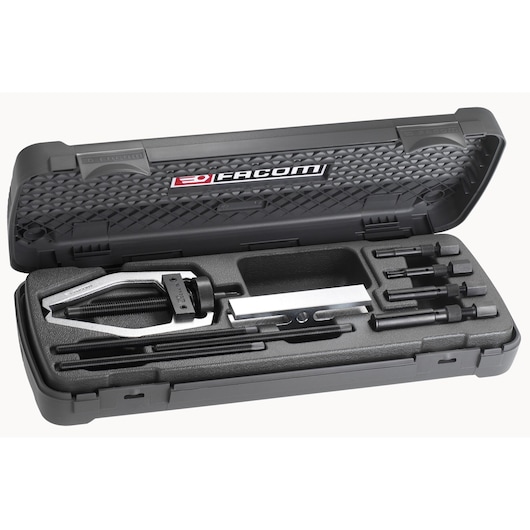 Facom U_301BJ1 bearing puller set in black hard case, top angle, with multiple components visible.