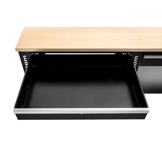 Facom WB2.2000DRAW black metal drawer under light wood workbench, front angle, white background.